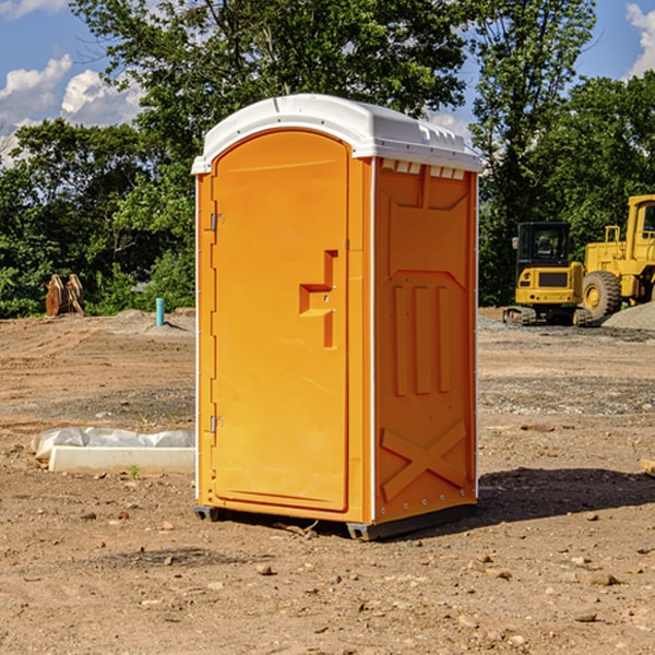 how often are the porta potties cleaned and serviced during a rental period in Mills